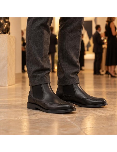 Black leather chelsea boots